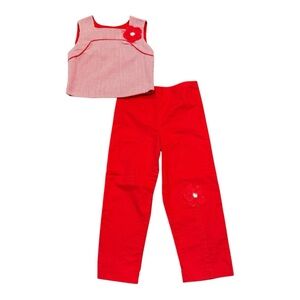 Reina Mora red and white pants outfit